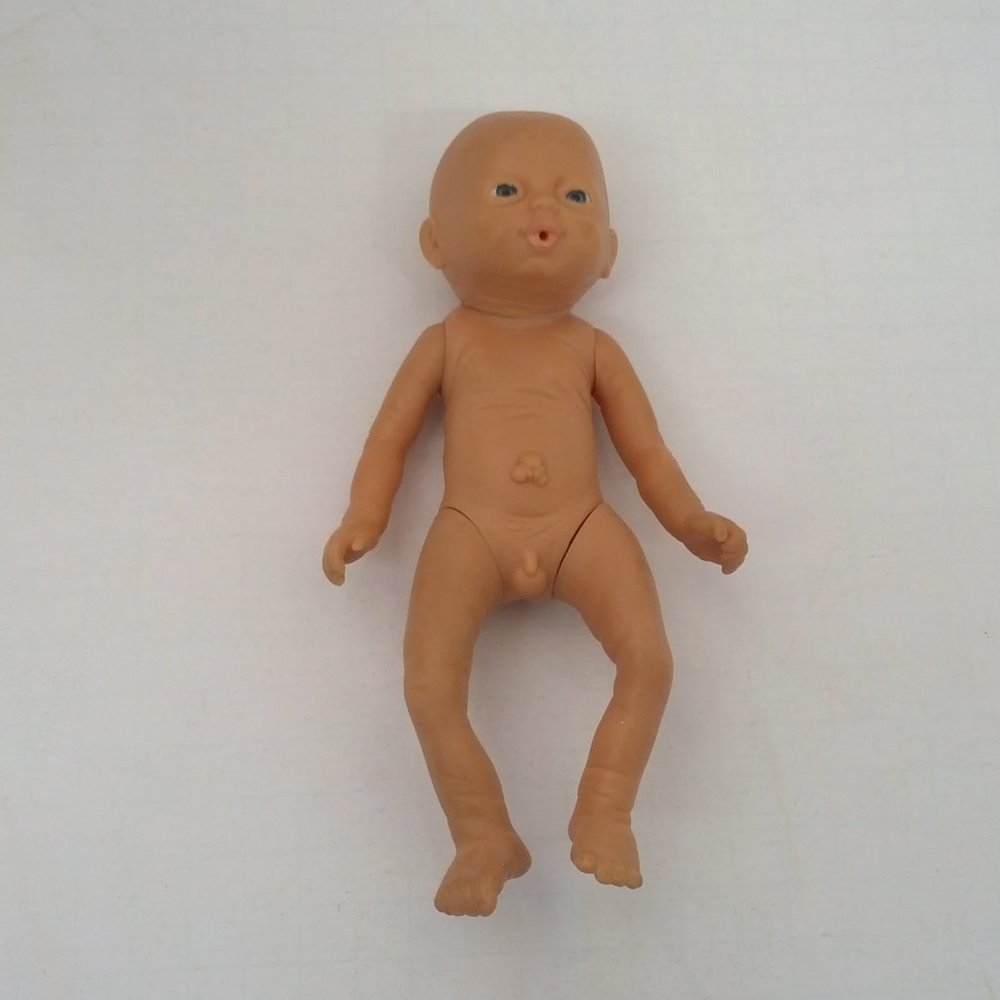 Vintage small newborn boy anatomically correct blue eyed baby doll